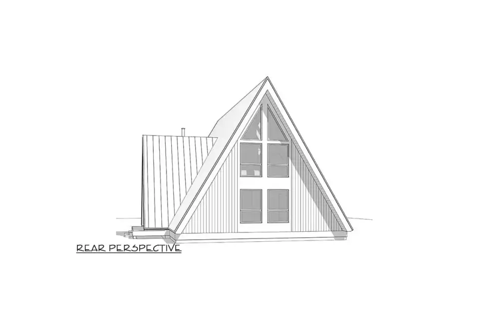 Front gable of the A-frame cabin filled with cross-mullion glazing, dark trim, and a warm lit interior visible through the two-story window wall at dusk