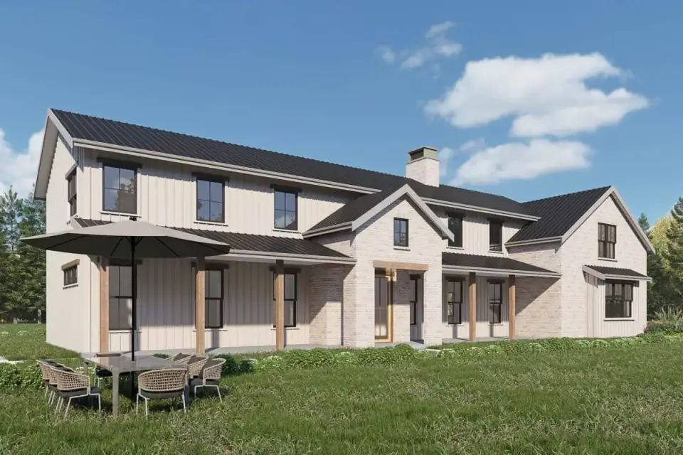 Angled exterior view showing the side-loaded four-car garage preserving a balanced symmetrical front facade