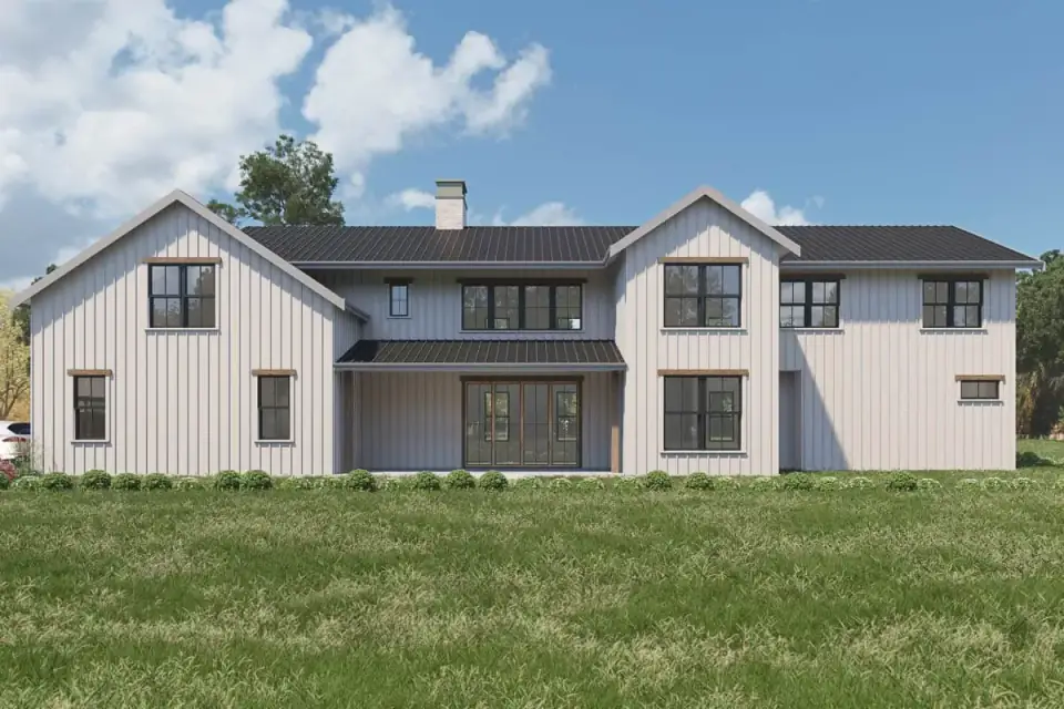 Exterior with tall divided windows in dark trim contrasting against lighter painted brick and vertical siding cladding