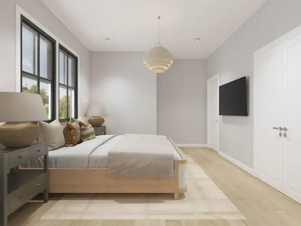 Entry and vestibule connecting living areas to the garage wing