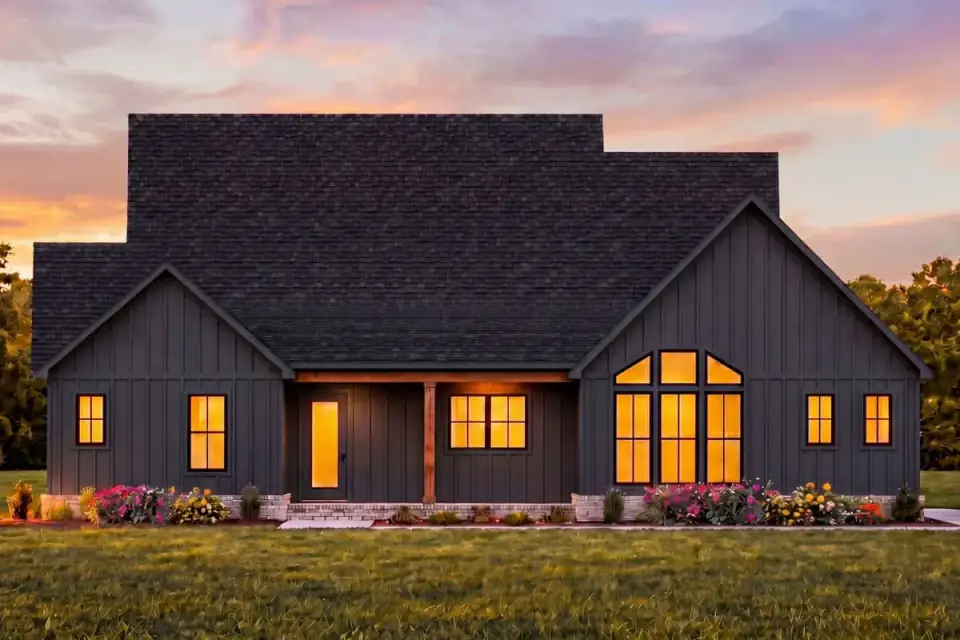 Rear elevation of the modern farmhouse with a covered back porch extending the outdoor living space