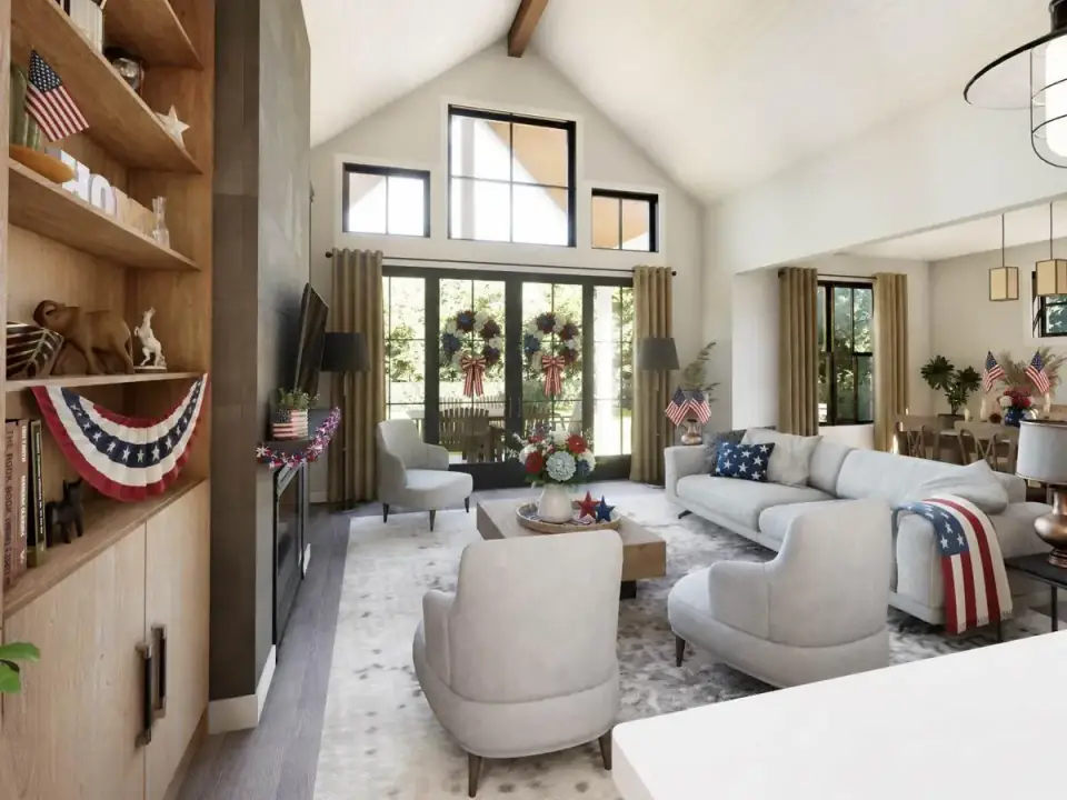 Vaulted rear covered porch with outdoor seating extending the great room to the backyard