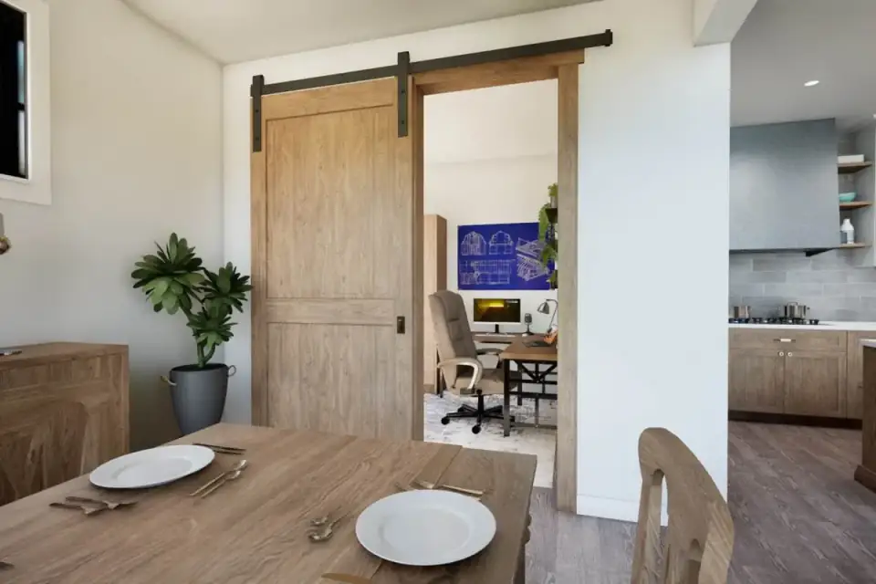 Walk-in master closet with built-in organizers connecting directly to the laundry room