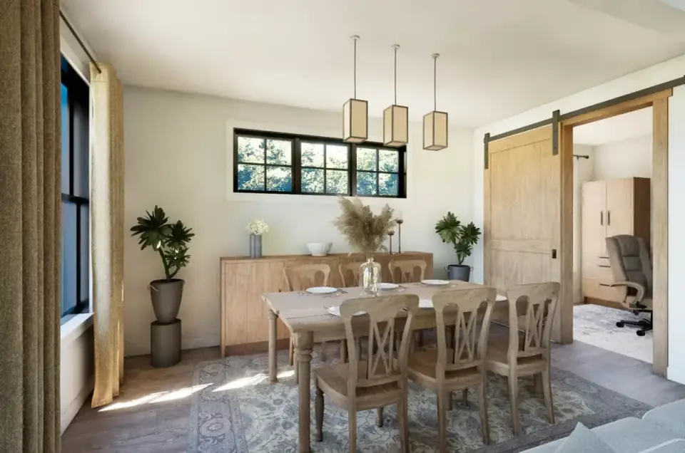 Secondary bedroom with neutral walls and natural light in the opposite wing of the split-bedroom plan