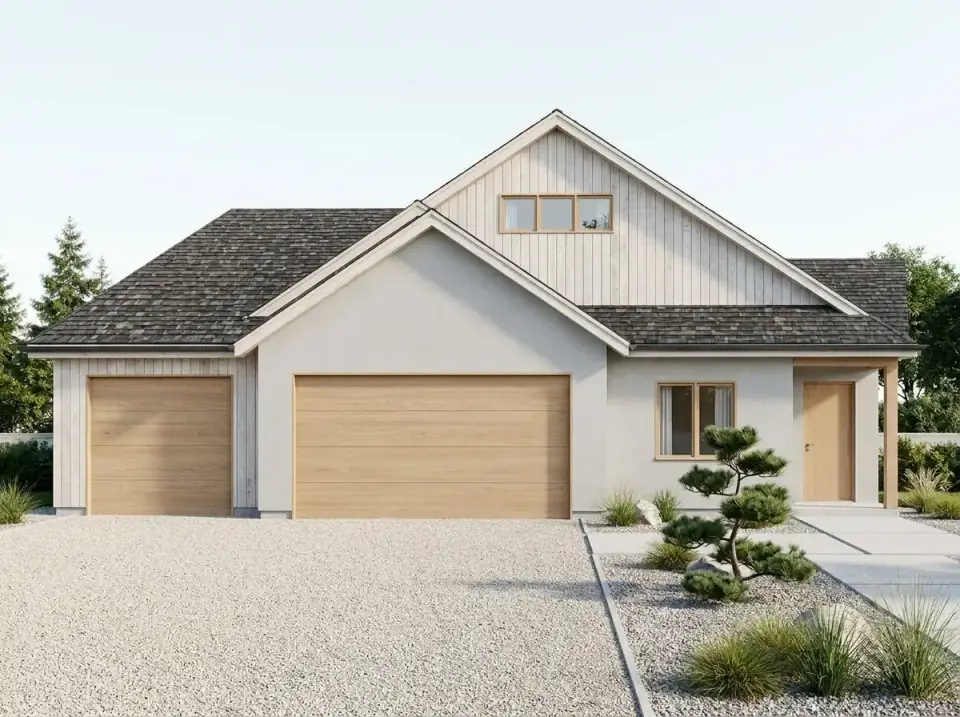 Coastal farmhouse facade of plan 267116SPK in whitewashed vertical siding with blonde wood garage doors and crushed-shell driveway flanked by coastal grasses