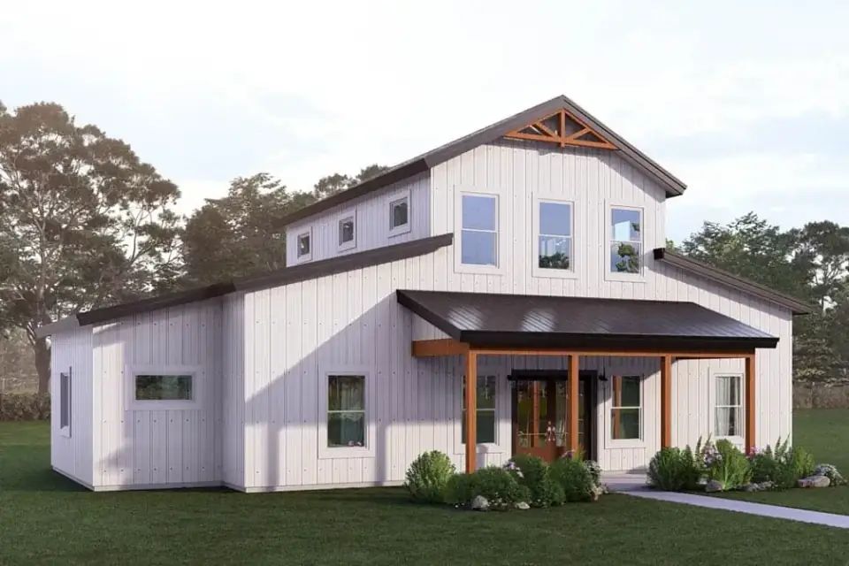 Front elevation of Plan 405152FDC showing the modern barndominium with tall gable front, exposed wood truss detail at the peak, standing-seam metal roof over the entry porch, vertical siding, smooth panel inserts at the entry volume, dark-trimmed windows and wood porch posts