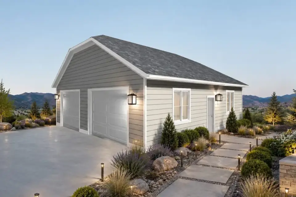 Garage exterior at dusk with warm interior lighting glowing through the side windows