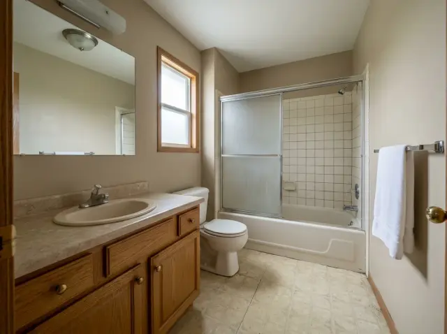 Dated Builder-Grade Bathroom Before Renovation