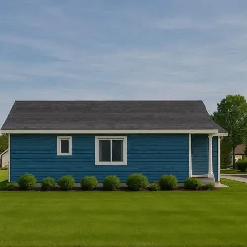 Side elevation of the 267118SPK ranch with minimal window openings and lap siding over a stone foundation line
